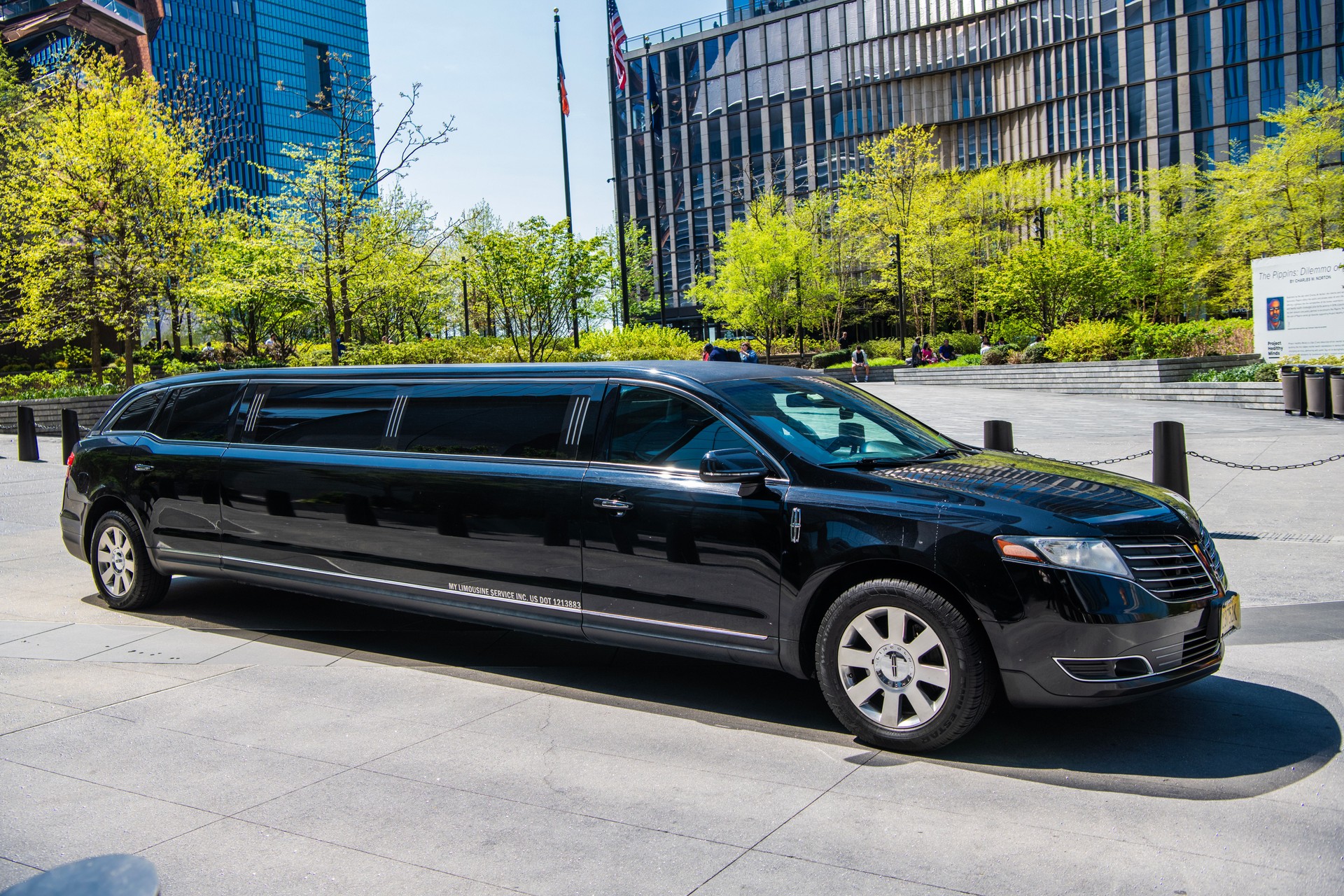 Lincoln MKT limousine luxury car black color, side view. Lincoln MKT lime car. Black luxury Lincoln MKT on the road. Luxurious Lincoln MKT outdoor